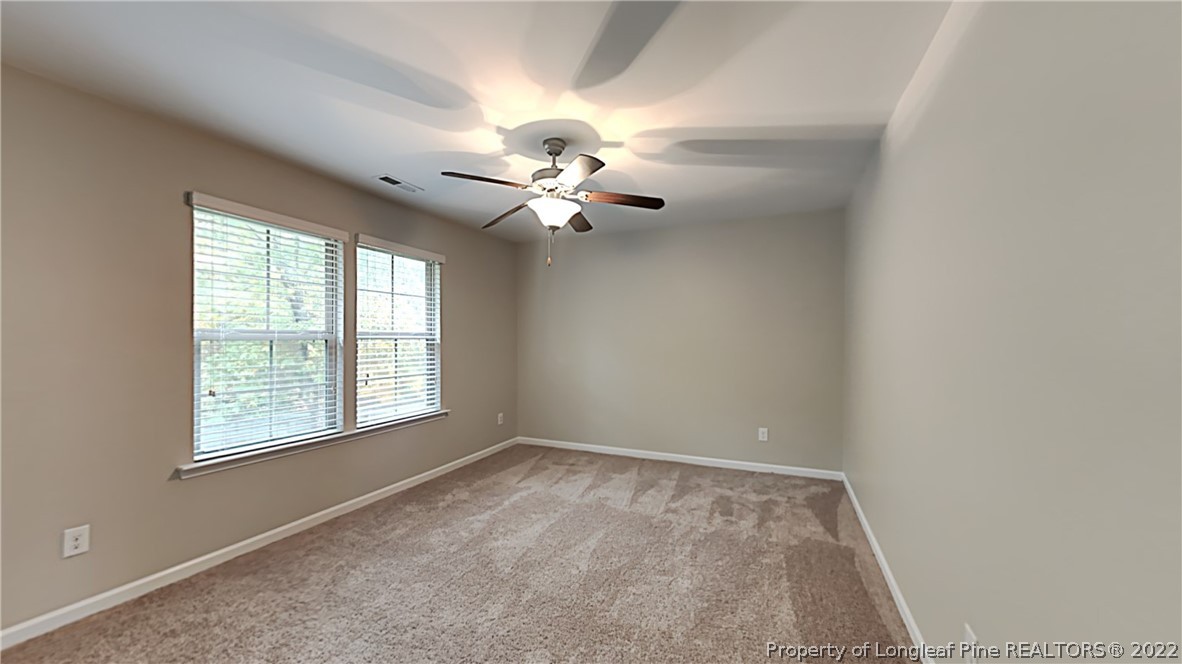 271 River Oak Street Spring Lake, NC 28390 - Photo 12 of 18 a view of an empty room with a window