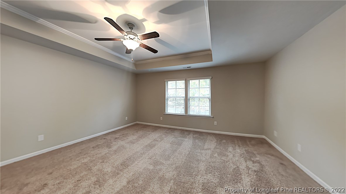 271 River Oak Street Spring Lake, NC 28390 - Photo 8 of 18 a view of an empty room with a window