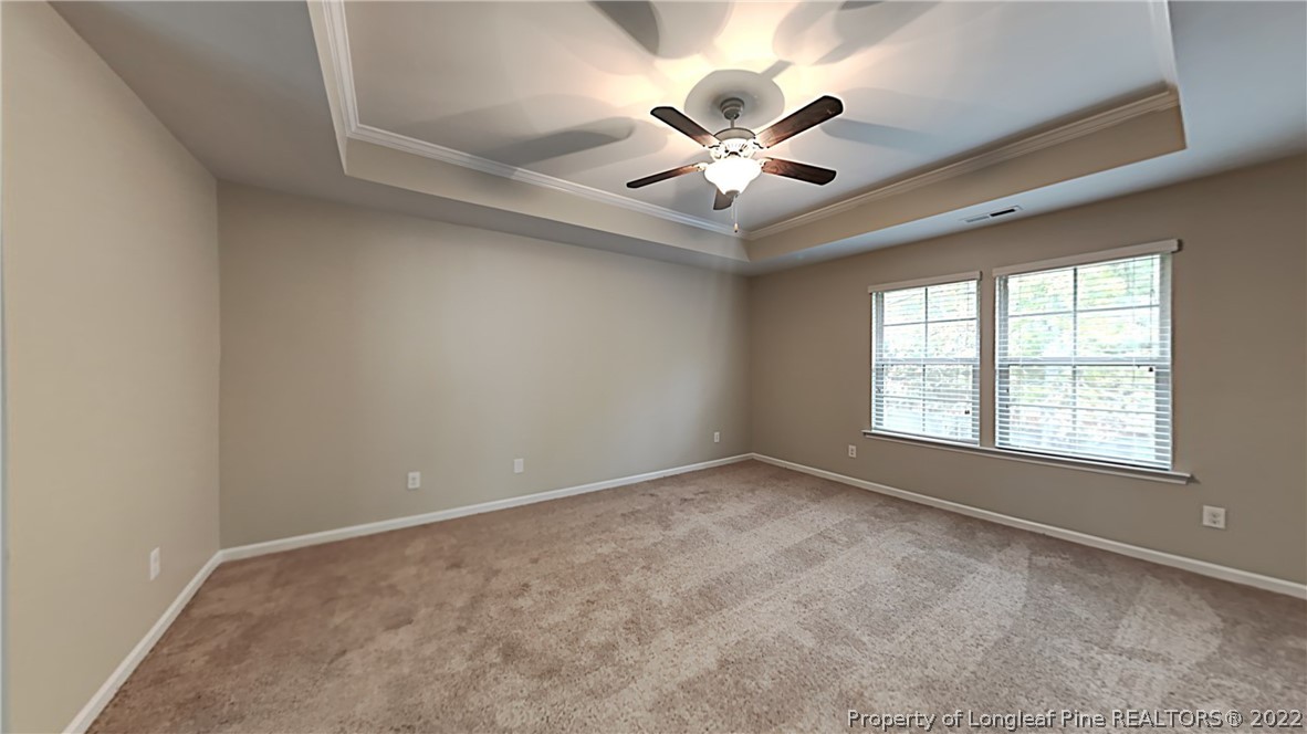 271 River Oak Street Spring Lake, NC 28390 - Photo 9 of 18 a view of an empty room with a window