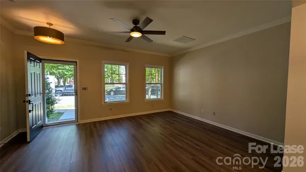 a view of entryway with wooden floor