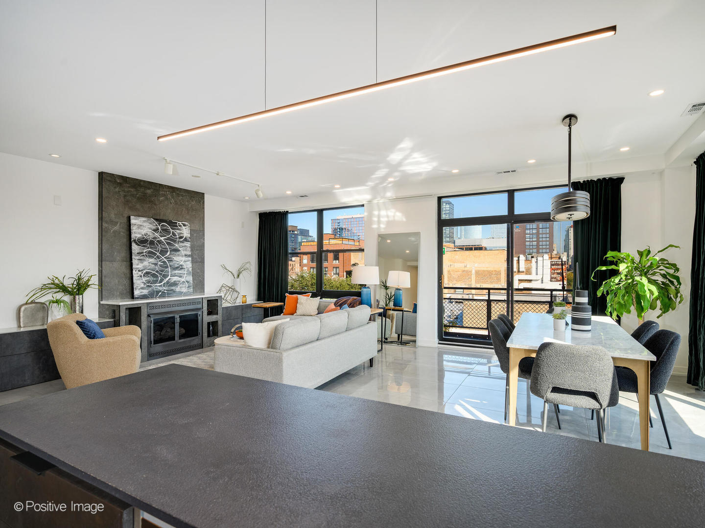 1260 West Washington Boulevard, Unit 404 Chicago, IL 60607 - Photo 11 of 26 a living room with fireplace furniture and a large window