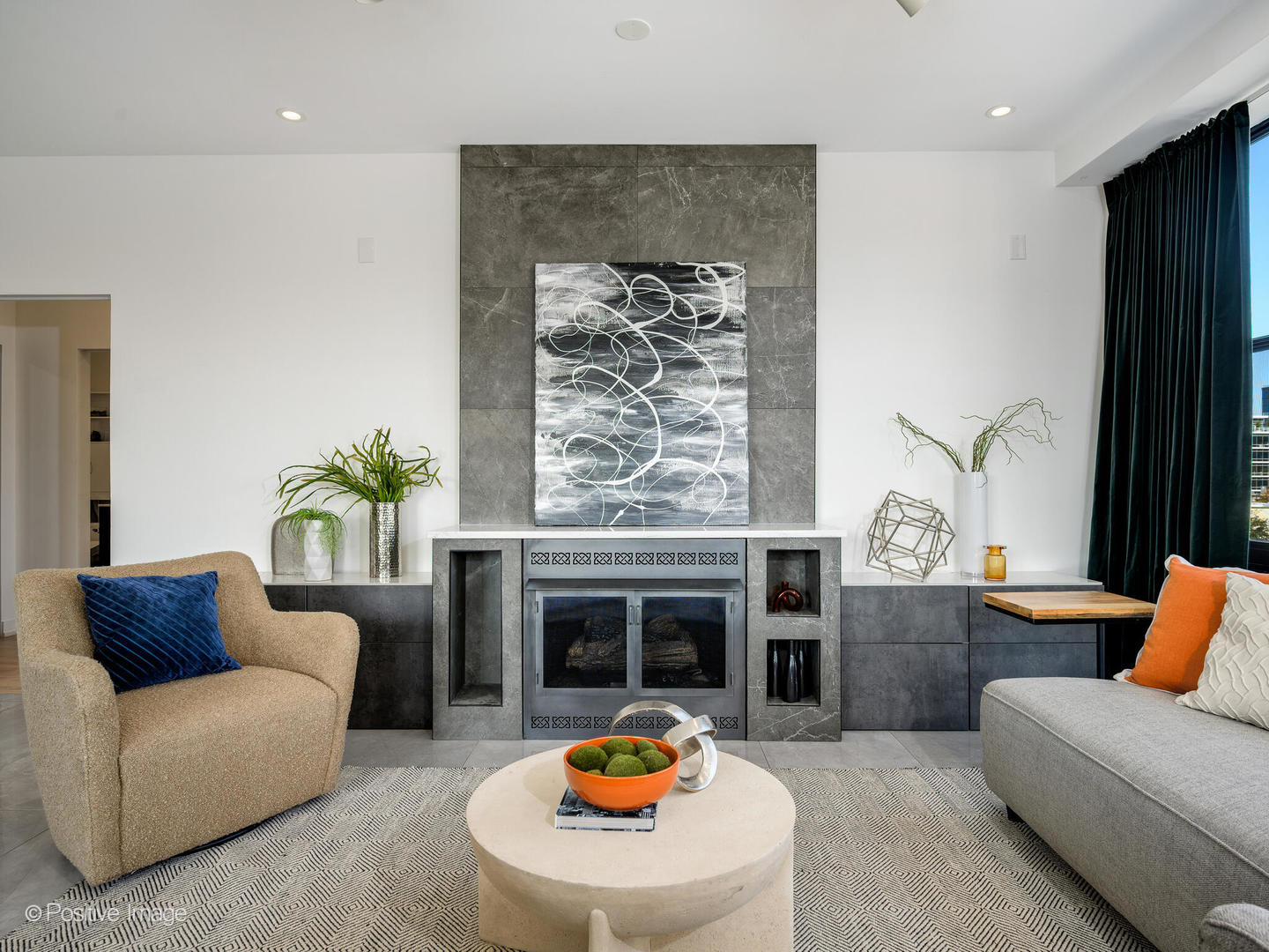 1260 West Washington Boulevard, Unit 404 Chicago, IL 60607 - Photo 13 of 26 a living room with furniture a fireplace and kitchen view