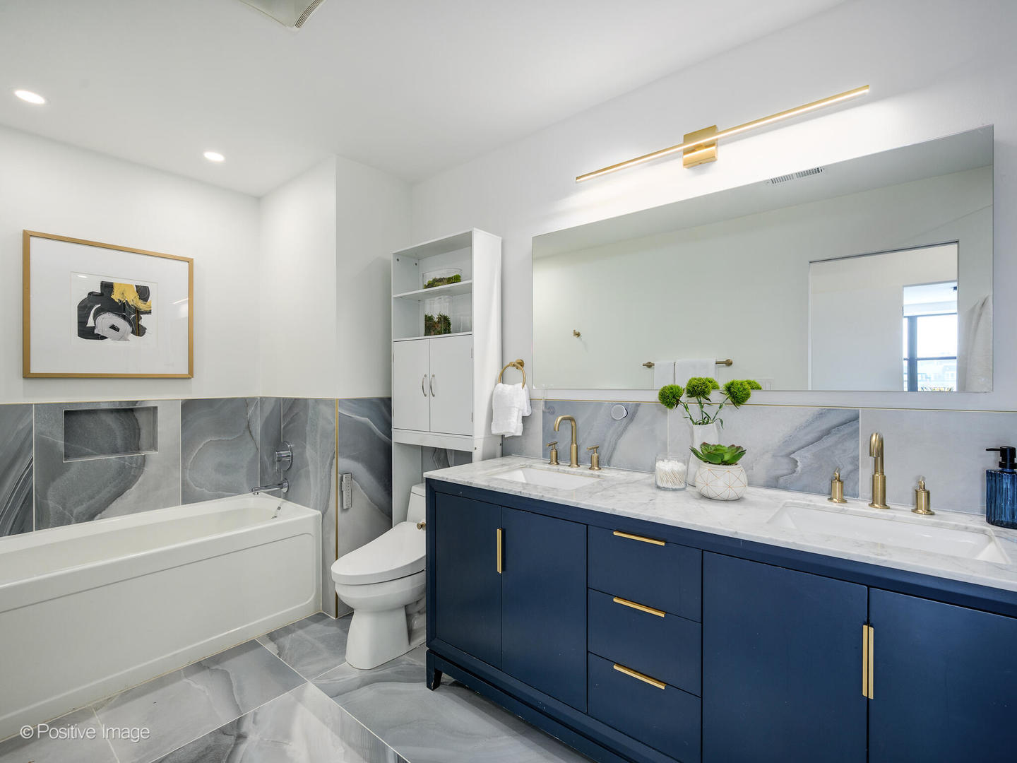 1260 West Washington Boulevard, Unit 404 Chicago, IL 60607 - Photo 15 of 26 a bathroom with a granite countertop bathtub sink vanity mirror and toilet