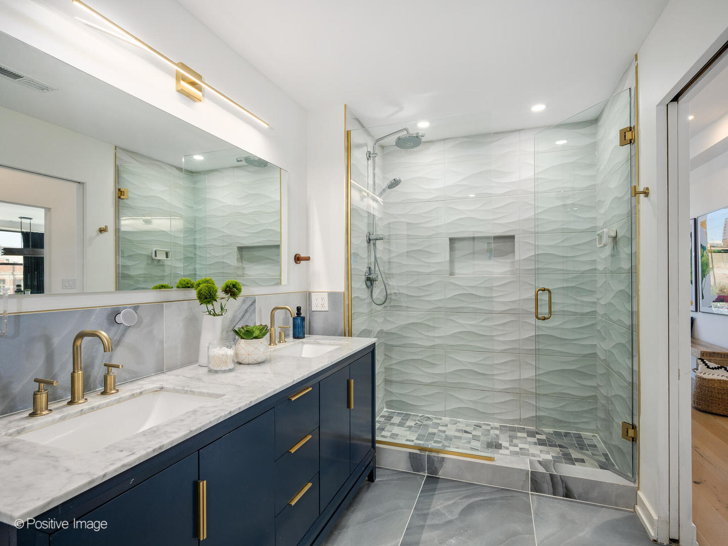 1260 West Washington Boulevard, Unit 404 Chicago, IL 60607 - Photo 16 of 26 a bathroom with a granite countertop sink mirror and shower