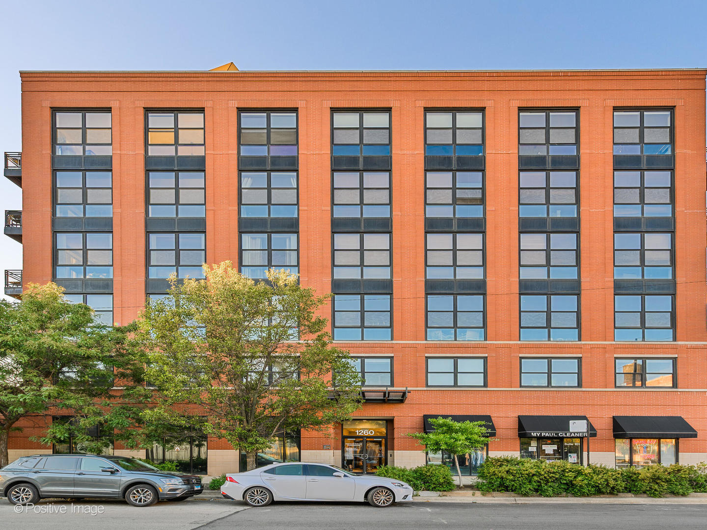 1260 West Washington Boulevard, Unit 404 Chicago, IL 60607 - Photo 26 of 26 a view of a car parked in front of a building