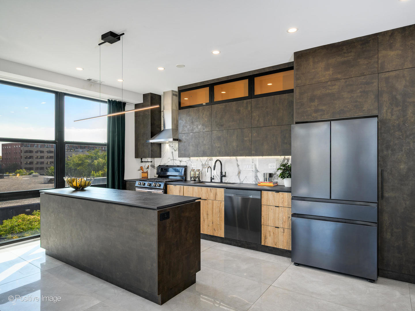 1260 West Washington Boulevard, Unit 404 Chicago, IL 60607 - Photo 6 of 26 a kitchen with stainless steel appliances granite countertop a refrigerator a sink a stove and a refrigerator
