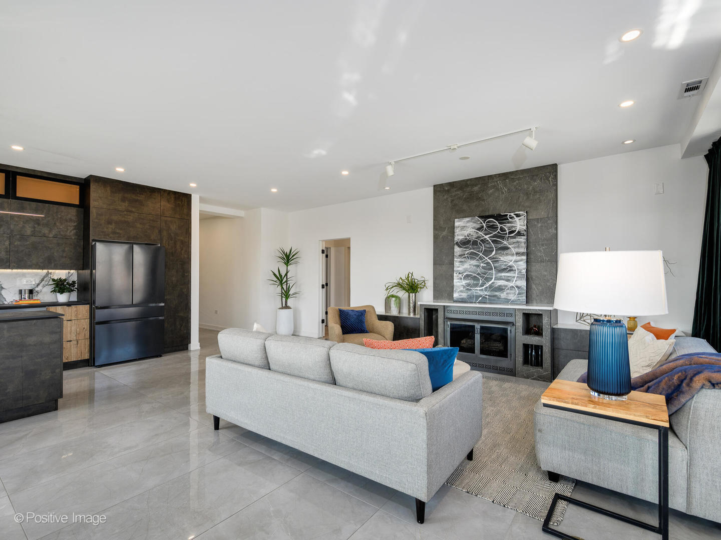 1260 West Washington Boulevard, Unit 404 Chicago, IL 60607 - Photo 9 of 26 a living room with furniture and a fireplace