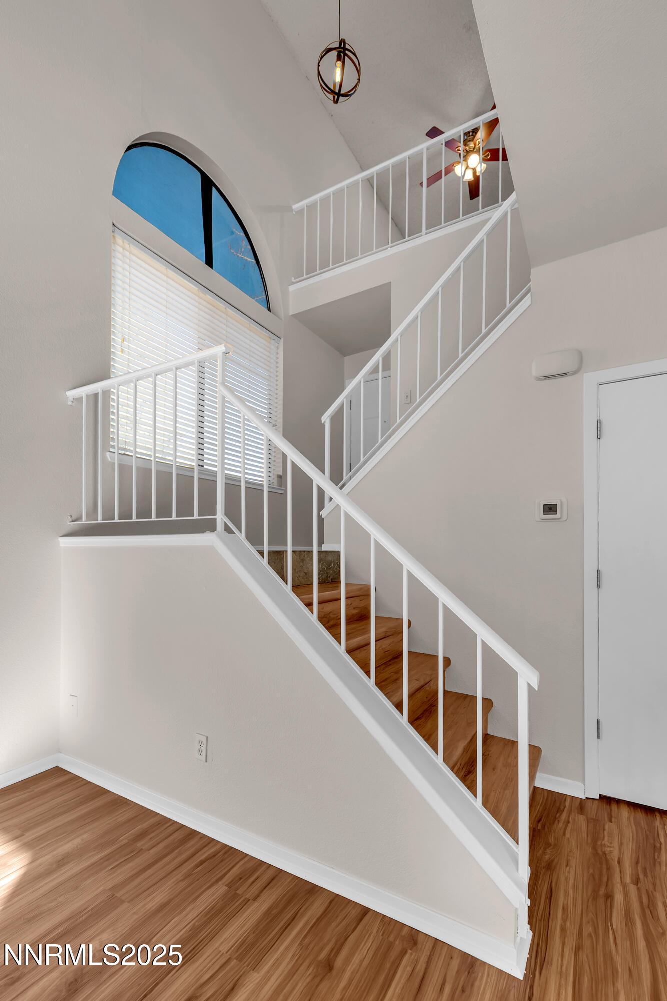 4301 Loreto Lane Reno, NV 89502 - Photo 11 of 36 a view of an entryway with wooden floor