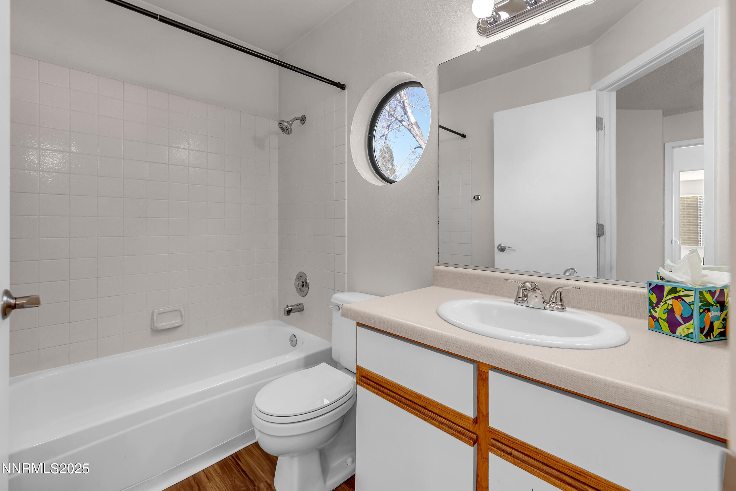 4301 Loreto Lane Reno, NV 89502 - Photo 25 of 36 a bathroom with a sink a toilet and a bathtub