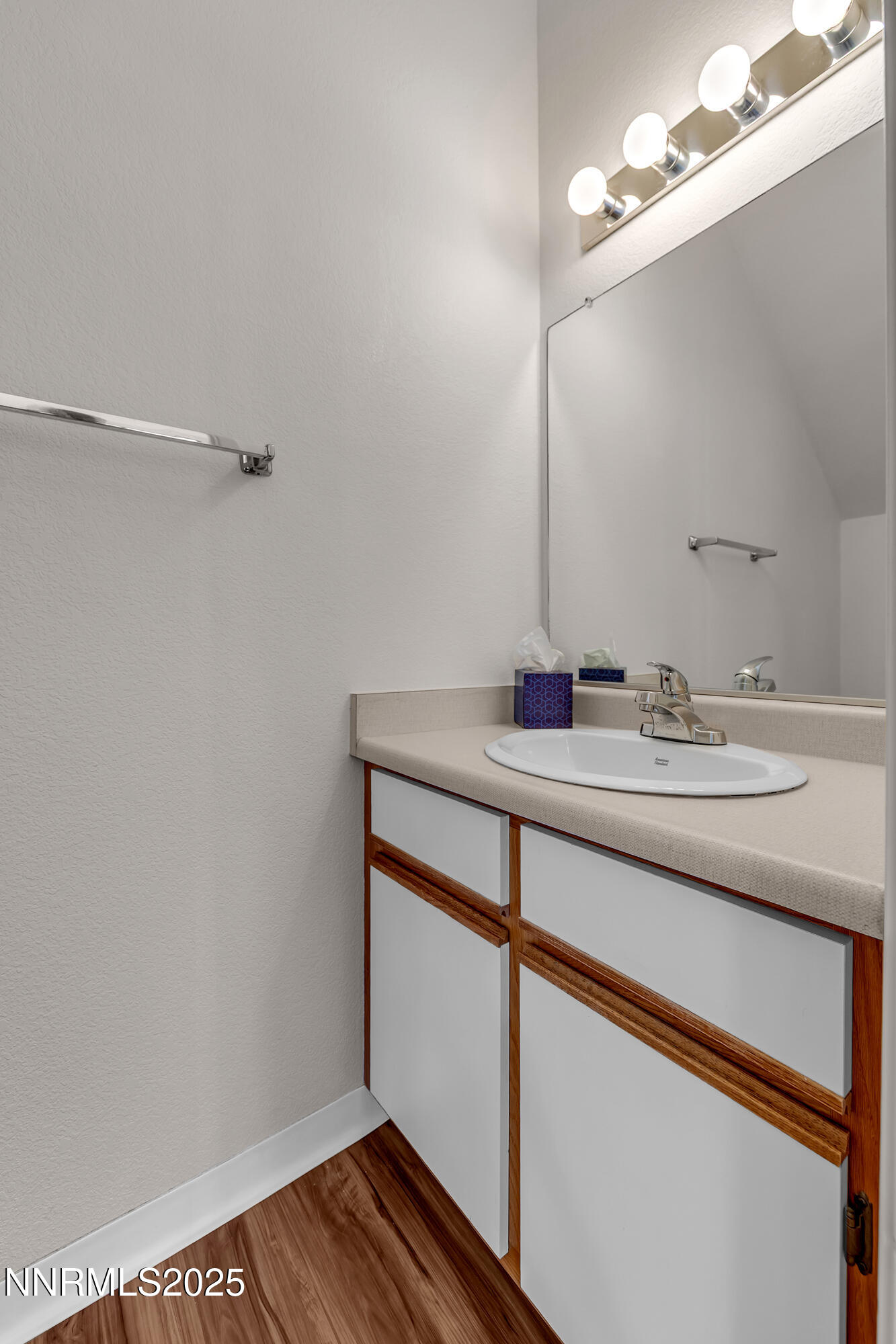 4301 Loreto Lane Reno, NV 89502 - Photo 31 of 36 a bathroom with a sink and a mirror