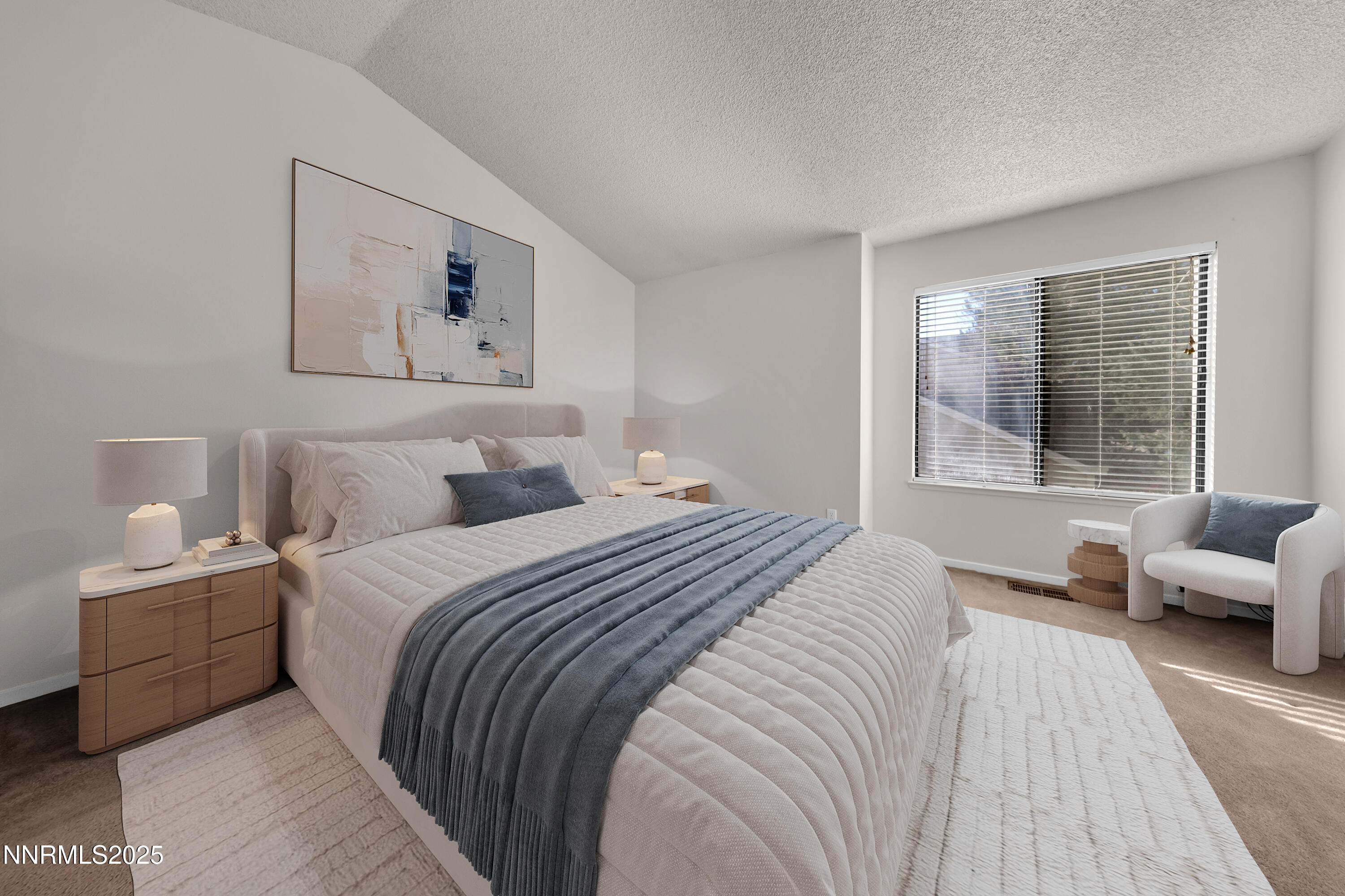 4301 Loreto Lane Reno, NV 89502 - Photo 36 of 36 a bedroom with a large bed and a couch