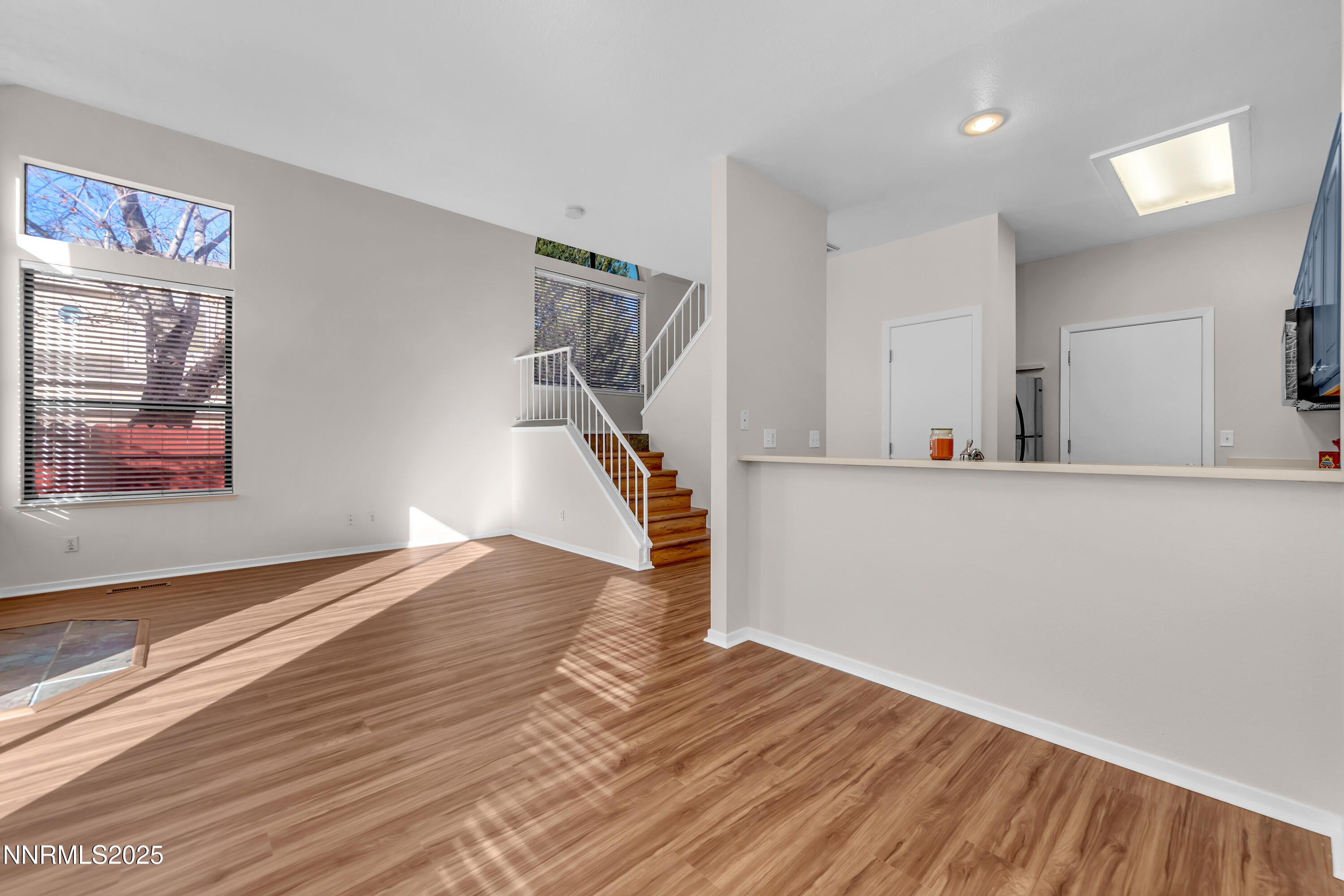 4301 Loreto Lane Reno, NV 89502 - Photo 9 of 36 a view of entryway and hall with wooden floor