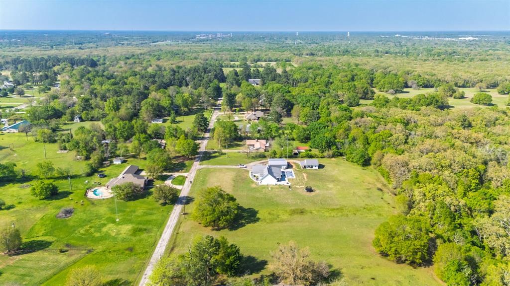 Tbd McKenzie Road Campbell, TX 75422 - Photo 15 of 32 a view of a lush green forest with trees and some houses