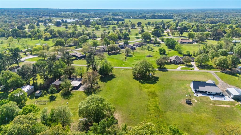 Tbd McKenzie Road Campbell, TX 75422 - Photo 21 of 32 an aerial view of residential houses with outdoor space and swimming pool