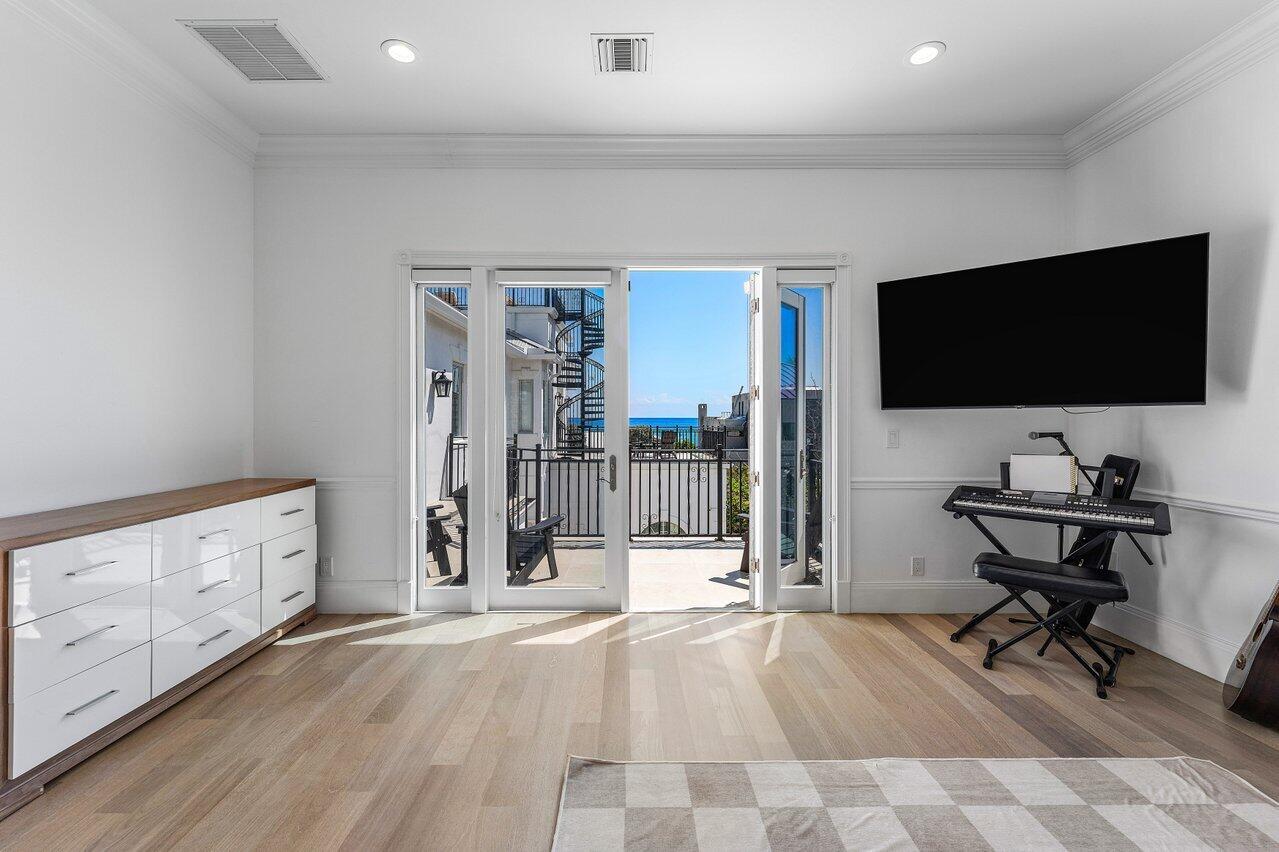 6080 Old Ocean Boulevard Ocean Ridge, FL 33435 - Photo 31 of 50 a view of a livingroom with a flat screen tv