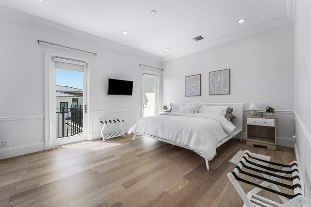 a kitchen with a sink cabinets and window