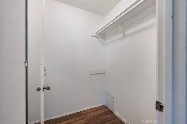 a view of outdoor kitchen with seating space