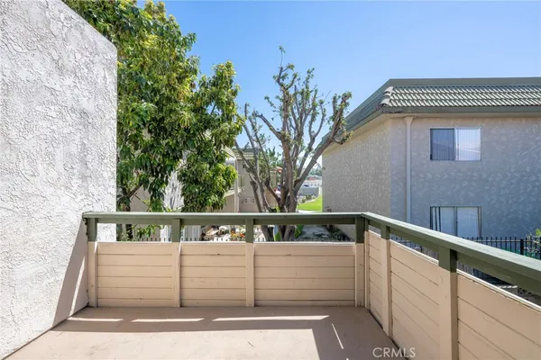 a view of a house with large windows