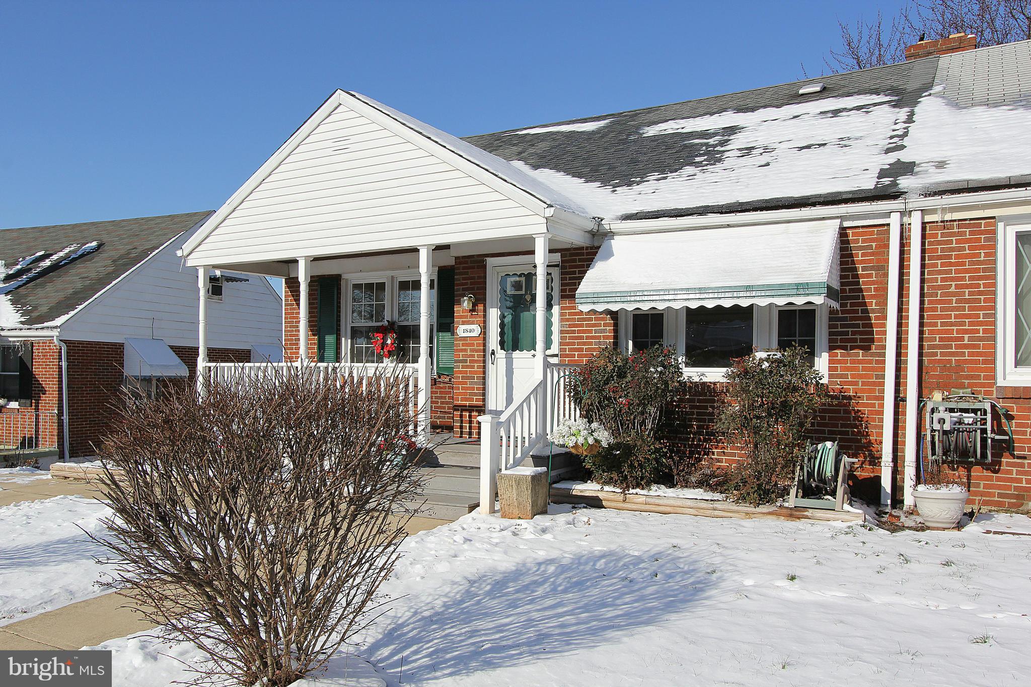 front view of a house with a patio