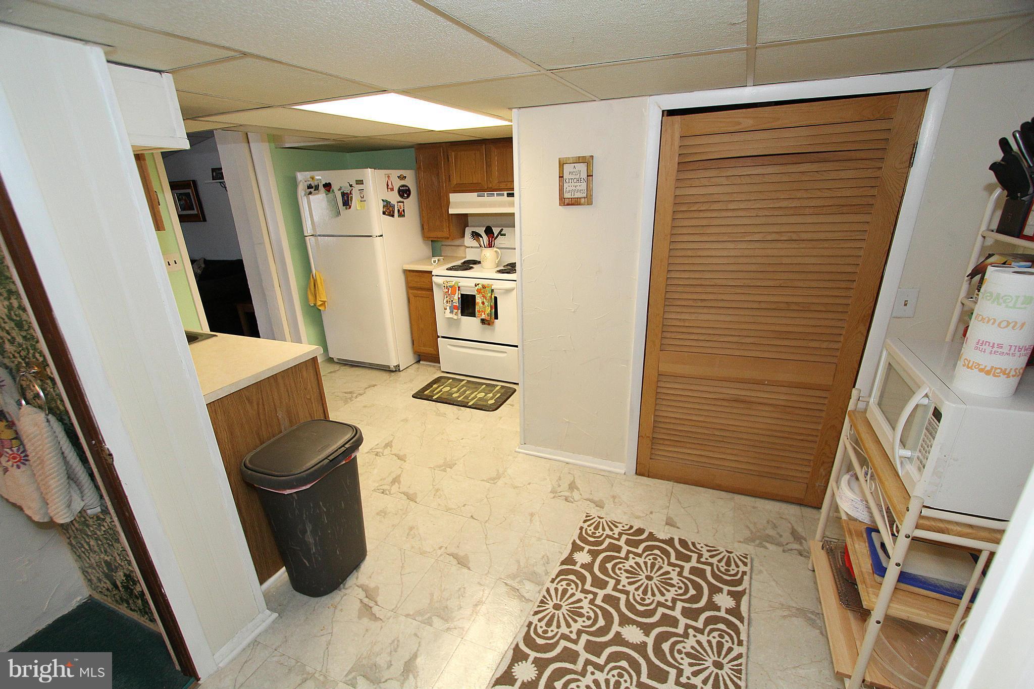 1810 Ellinwood Road Baltimore, MD 21237 - Photo 22 of 30 a bathroom with a toilet and a shower