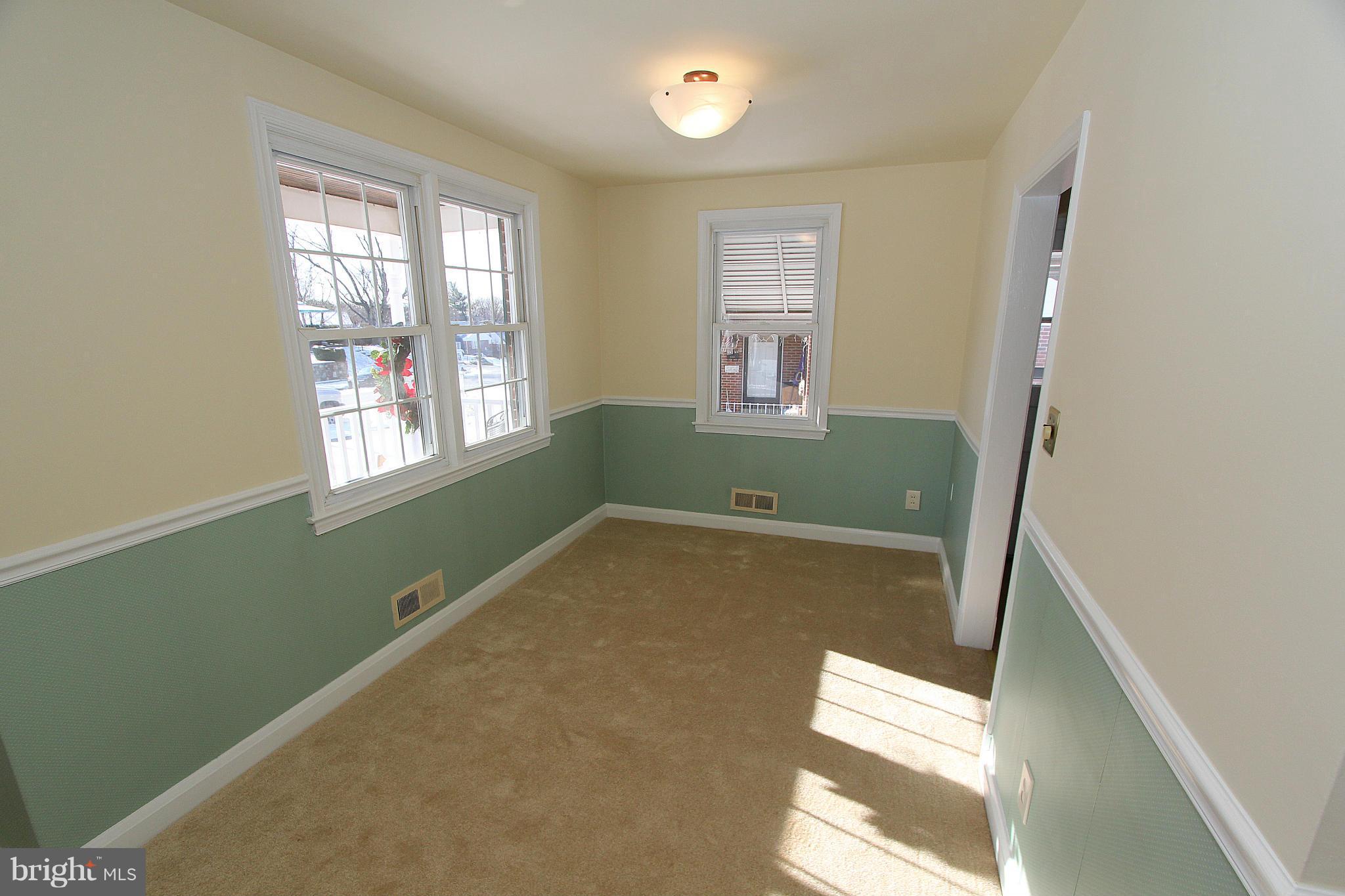 1810 Ellinwood Road Baltimore, MD 21237 - Photo 7 of 30 a bathroom with a sink and a window