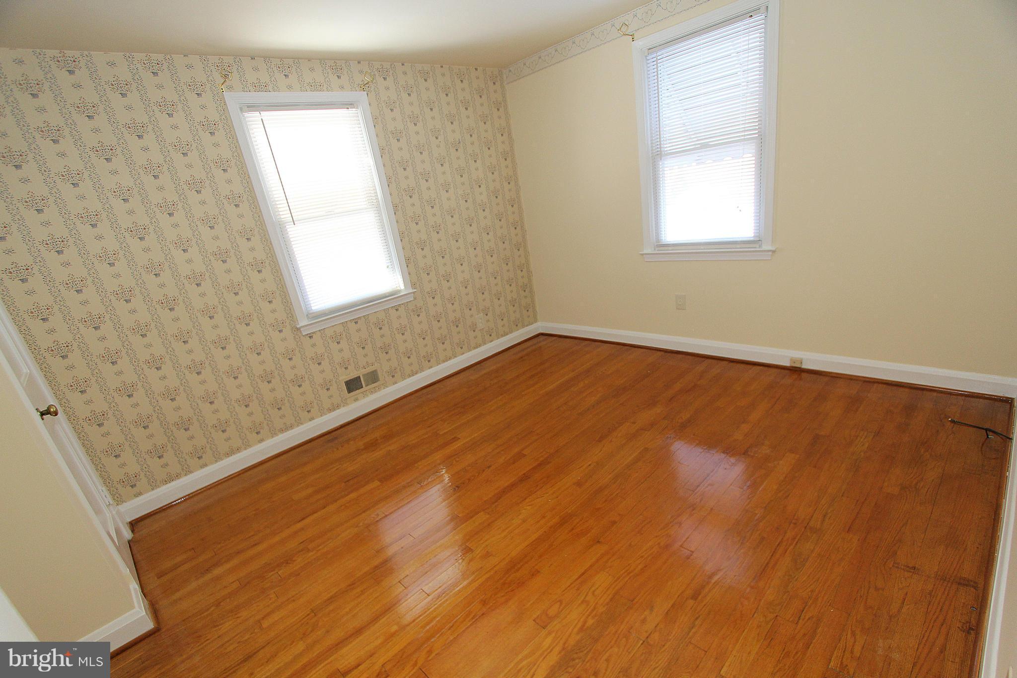 1810 Ellinwood Road Baltimore, MD 21237 - Photo 9 of 30 a view of an empty room and window