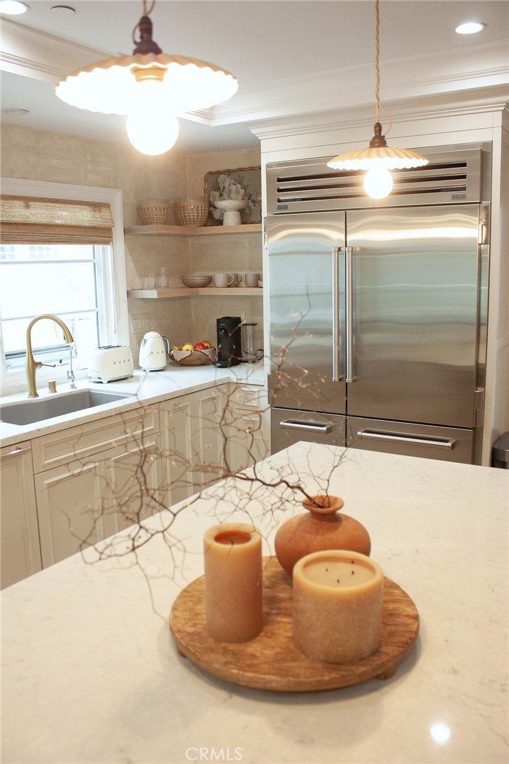 2159 Lorain Road San Marino, CA 91108 - Photo 17 of 48 a kitchen with a sink and a refrigerator