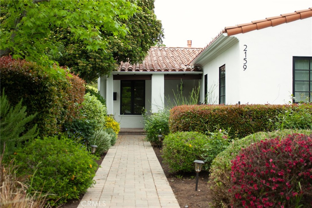 2159 Lorain Road San Marino, CA 91108 - Photo 2 of 48 a view of a house with potted plants