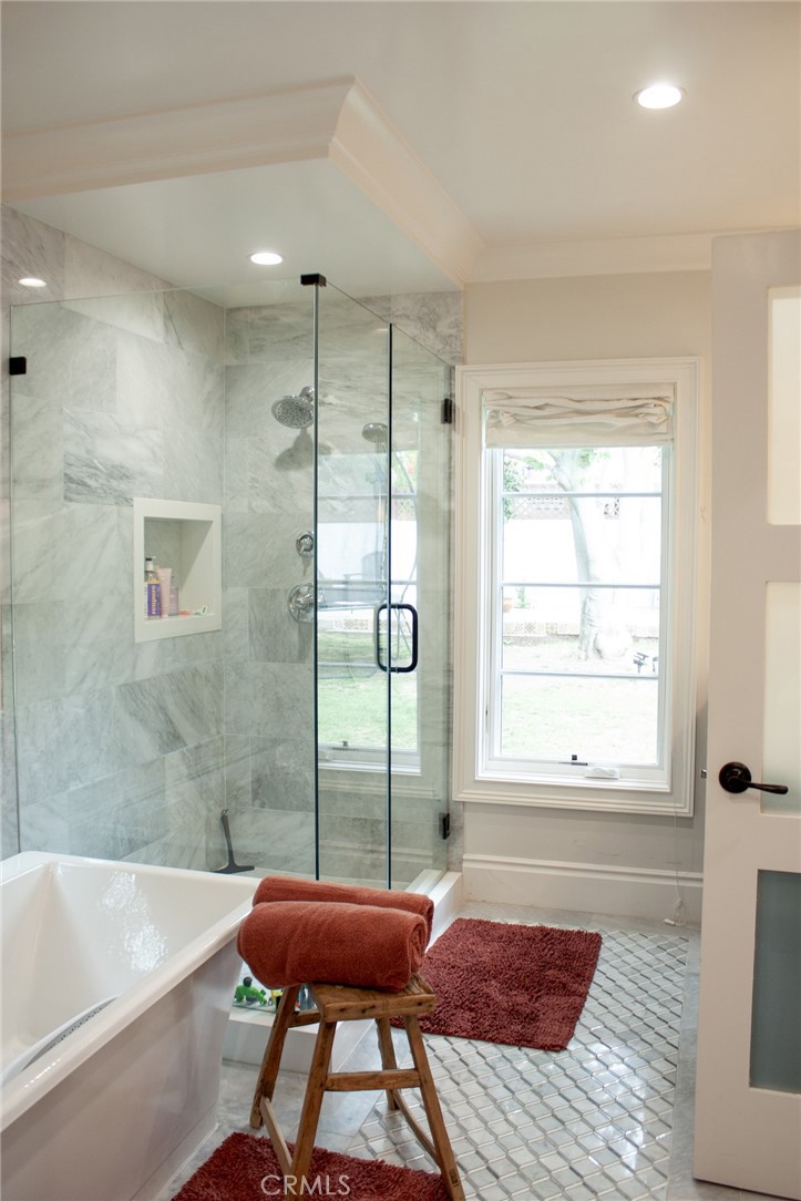 2159 Lorain Road San Marino, CA 91108 - Photo 25 of 48 a bathroom with a bathtub and a shower