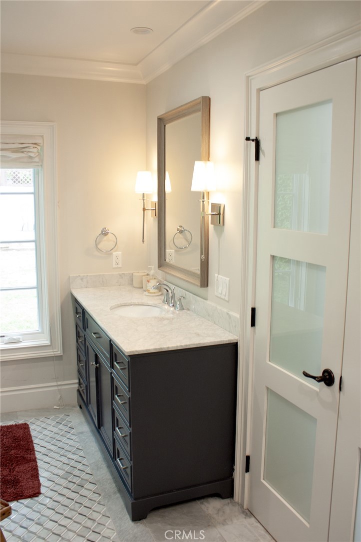 2159 Lorain Road San Marino, CA 91108 - Photo 26 of 48 a utility room with a sink and a mirror