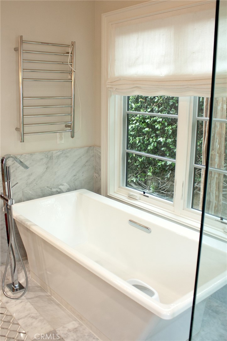 2159 Lorain Road San Marino, CA 91108 - Photo 27 of 48 a bath tub sitting in a bathroom next to a window