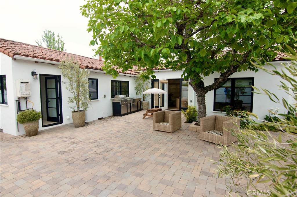 2159 Lorain Road San Marino, CA 91108 - Photo 41 of 48 a view of a house with patio and a garden