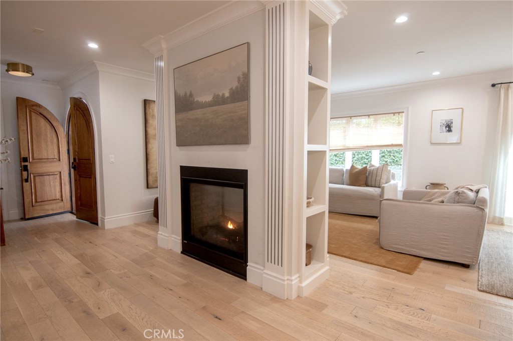 2159 Lorain Road San Marino, CA 91108 - Photo 6 of 48 a living room with furniture and a fireplace