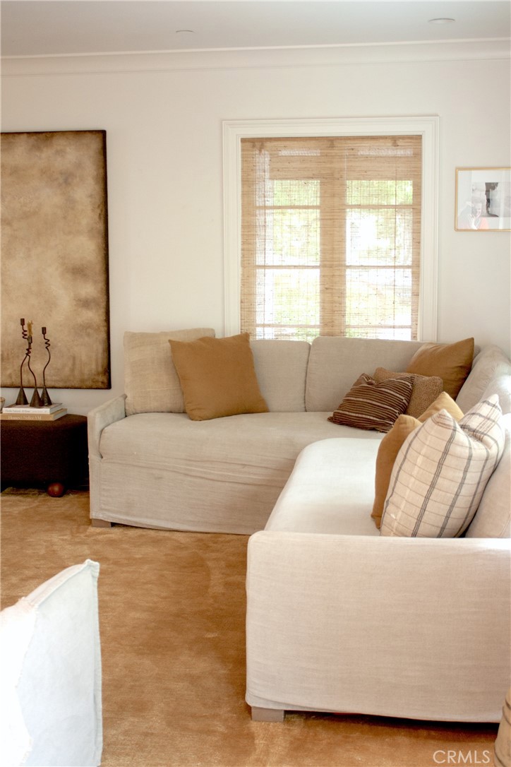 2159 Lorain Road San Marino, CA 91108 - Photo 9 of 48 a living room with couches and a couch with wooden floor