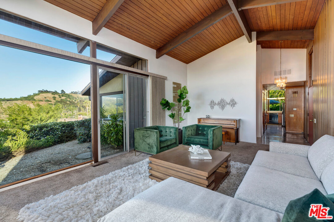 5961 Wrightcrest Drive Culver City, CA 90232 - Photo 12 of 41 a view of a porch with furniture and garden