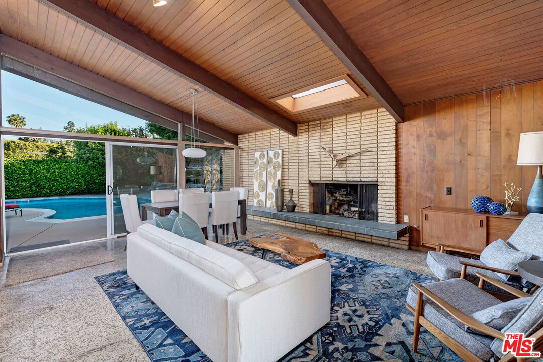 5961 Wrightcrest Drive Culver City, CA 90232 - Photo 13 of 41 a living room with furniture and a fireplace