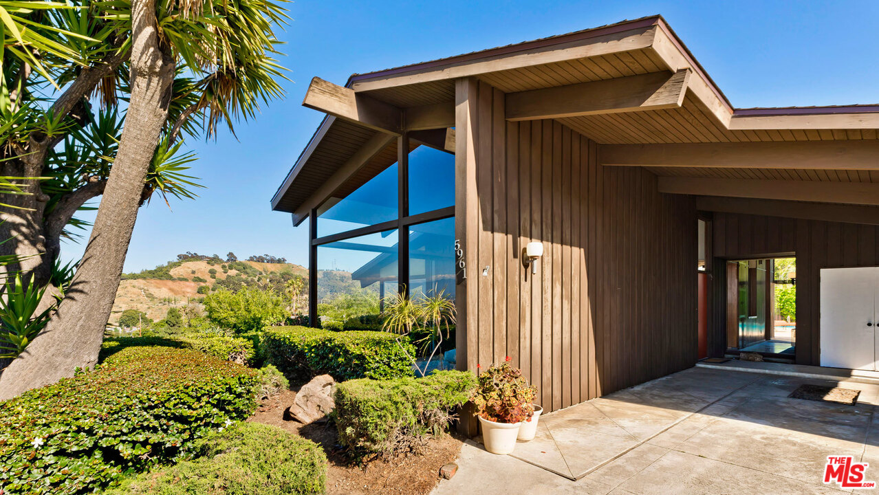5961 Wrightcrest Drive Culver City, CA 90232 - Photo 2 of 41 a front view of a house with a yard