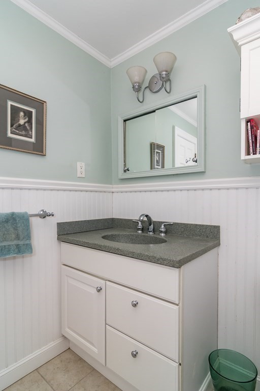 13 Colonial Road Dover, MA 02030 - Photo 13 of 23 a bathroom with a granite countertop sink and a mirror