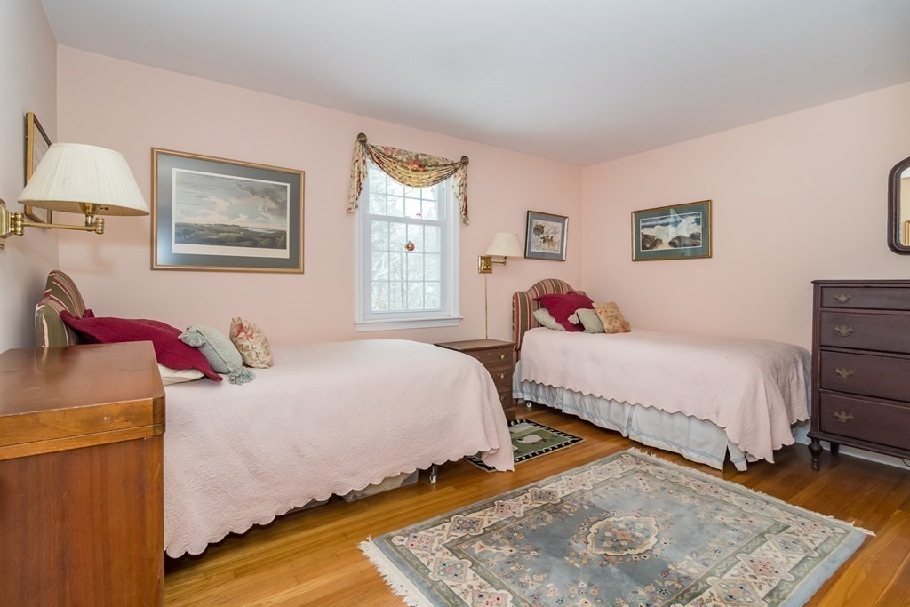 13 Colonial Road Dover, MA 02030 - Photo 14 of 23 a bedroom with bed and a window