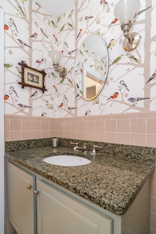 13 Colonial Road Dover, MA 02030 - Photo 15 of 23 a bathroom with a granite countertop sink and a mirror