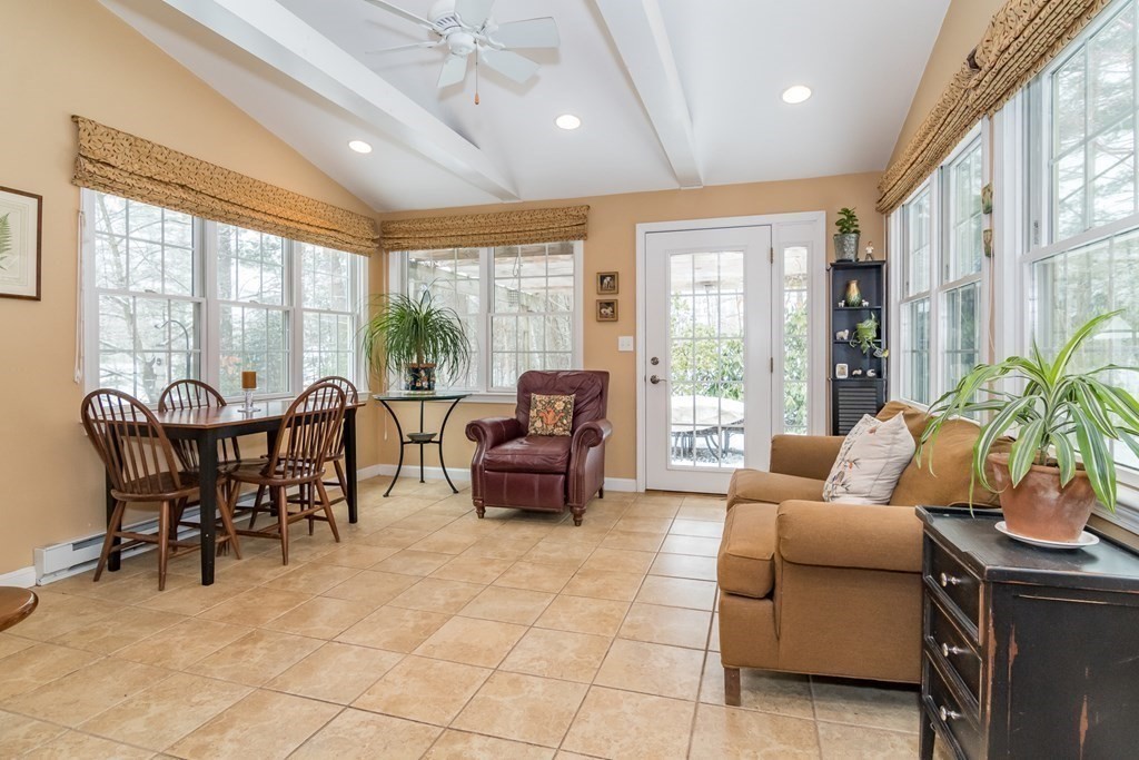 13 Colonial Road Dover, MA 02030 - Photo 8 of 23 a living room with furniture and floor to ceiling windows