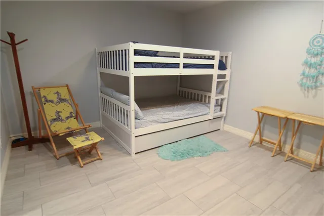 a bathroom with a toilet and a sink