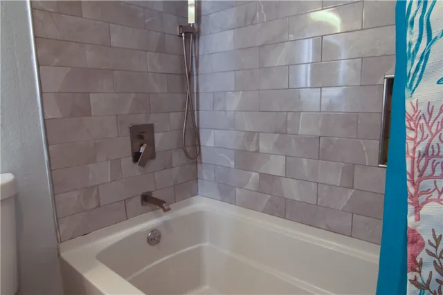 a view of balcony with furniture