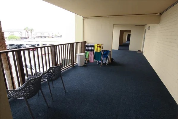 a view of a balcony with an outdoor space