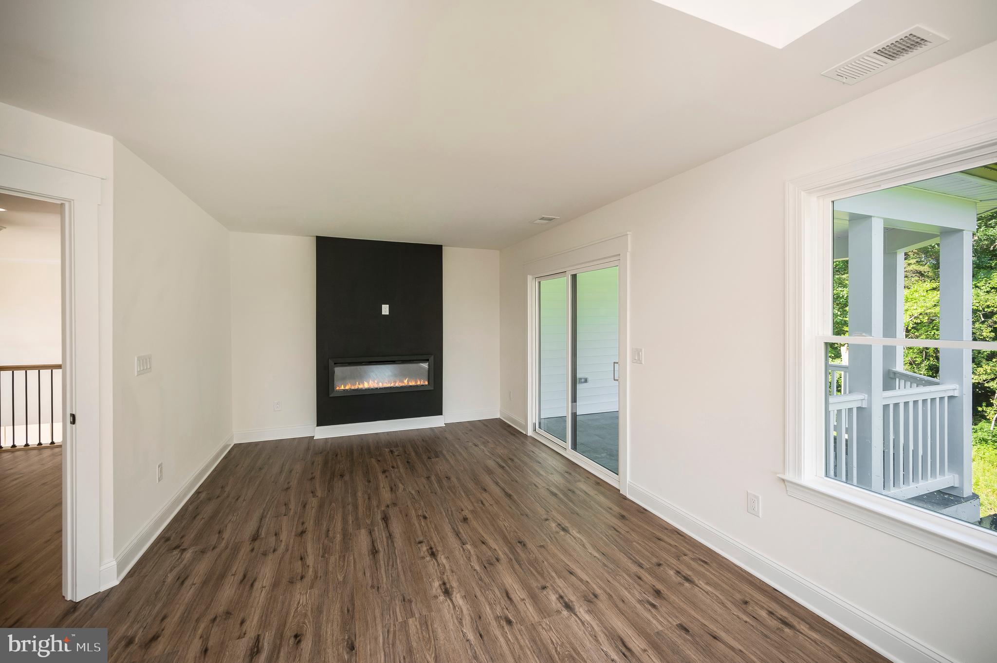 13208 Bristow Road Nokesville, VA 20181 - Photo 32 of 58 Sitting area of primary - door lead to veranda