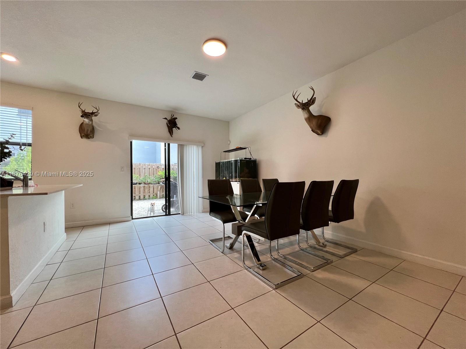 13371 Southwest 287th Street Homestead, FL 33033 - Photo 3 of 37 a living room with furniture