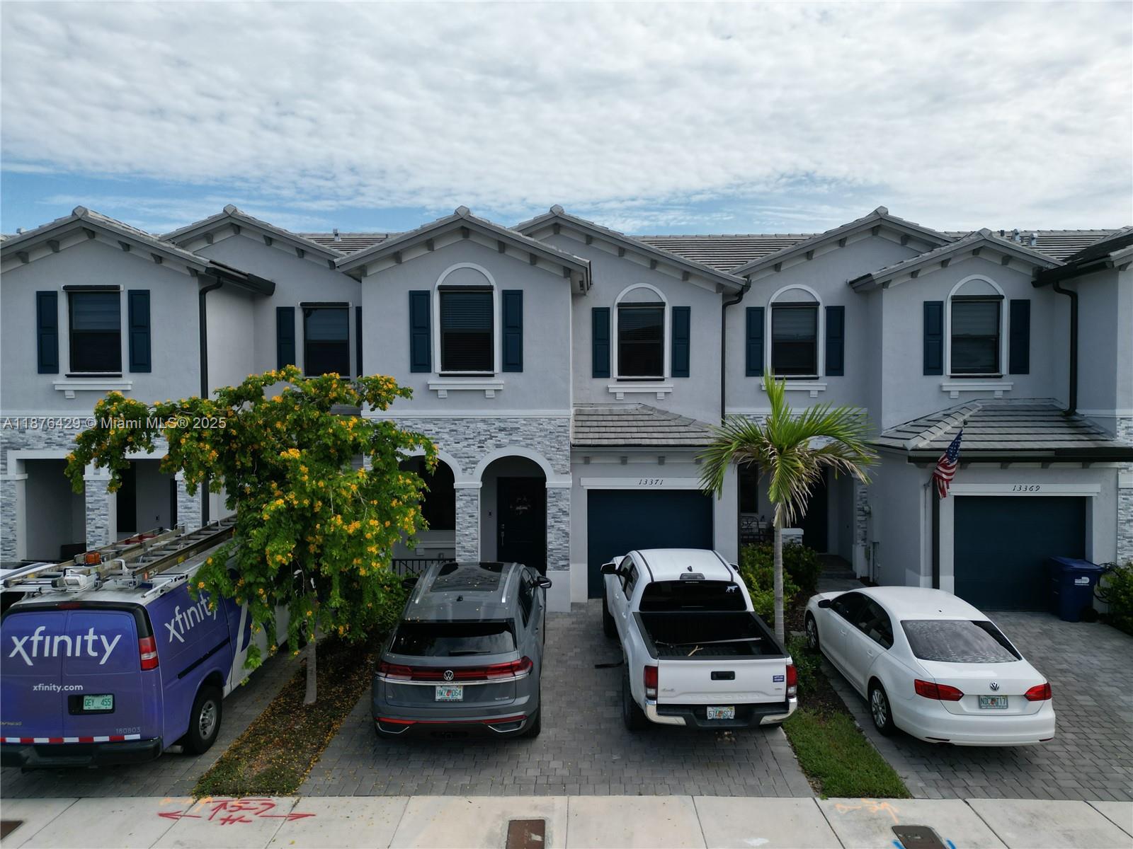 13371 Southwest 287th Street Homestead, FL 33033 - Photo 35 of 37 a car parked in front of a house