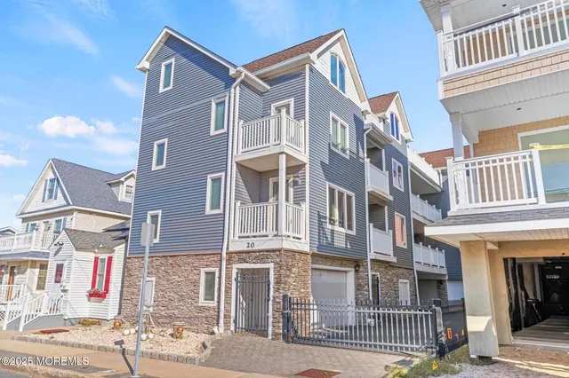 a bathroom with a sink toilet and a mirror