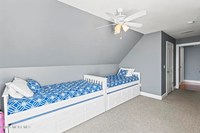 a view of a garage with a bike and car