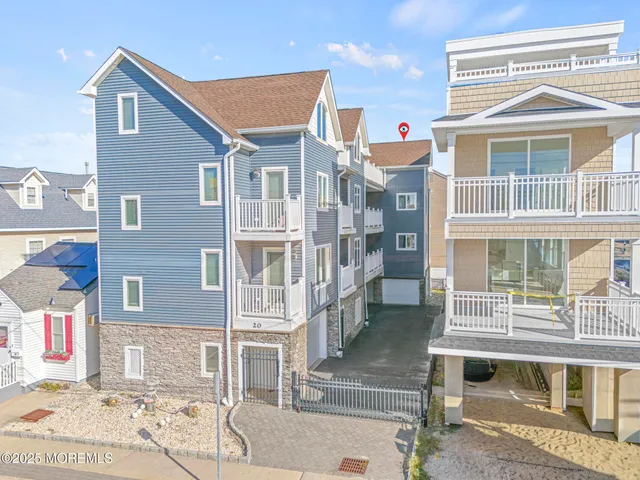 an aerial view of a building with outdoor space